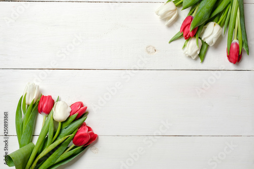Canvas Print Tulips flowers on white wooden background