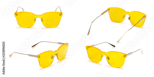 Metal sunglasses with polarizing yellow gradient Mirror Lens  isolated on white background. Fashionable summer eye glasses collection photo