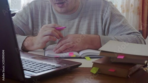 Wallpaper Mural modern man working sitting at the table Torontodigital.ca