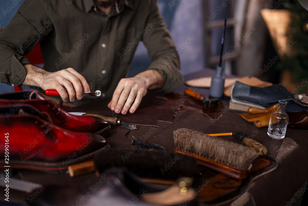 nab cutting the draft of footwear, close up cropped photo nab cutting the draft of footwear, close up cropped photo