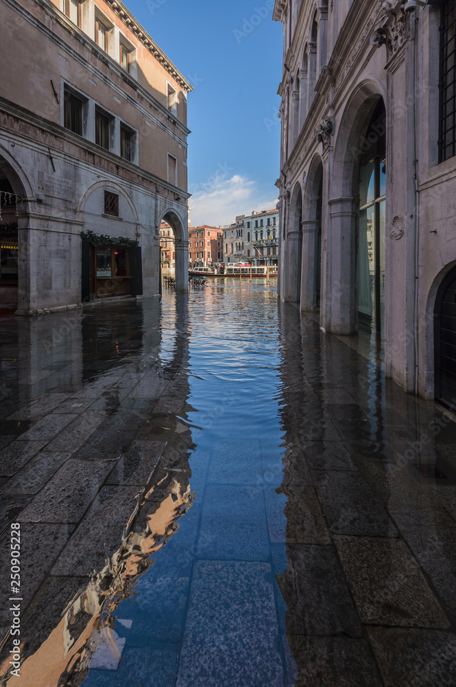 Street under water during flood, Venice, Italy.