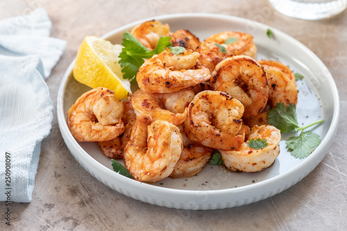 Photography Spicy garlic chilli Prawns Shrimps with lemon and cilantro