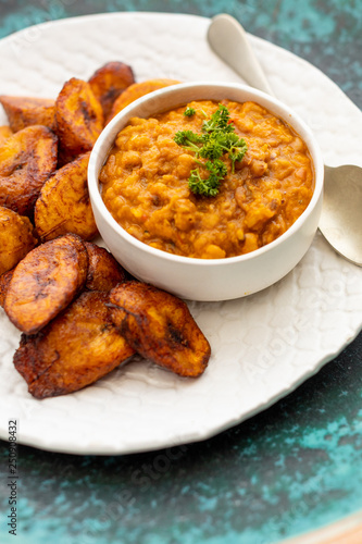 Chana masala with fried plantains photo