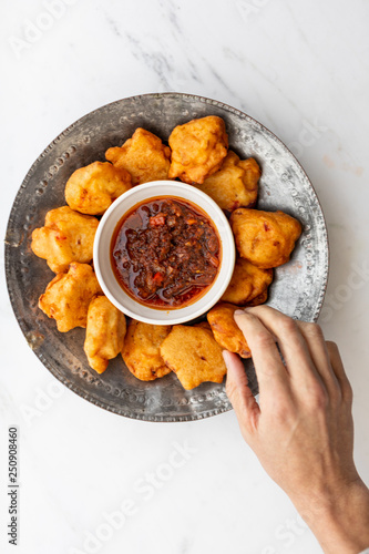 Pakora fritters with dipping sauce