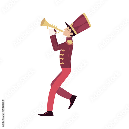 Parade participant, young trumpeter plays trumpet.