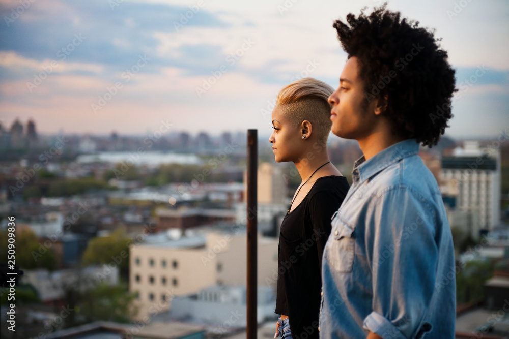Couple looking at city Couple looking at city