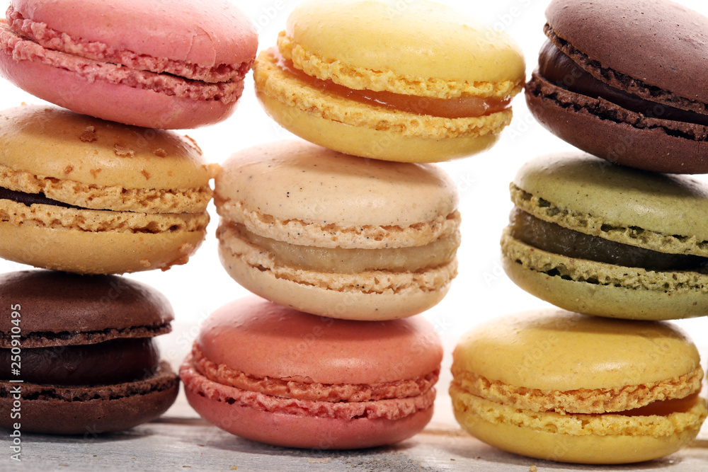 Sweet and colourful french macaroons or macaron on white background Sweet and colourful french macaroons or macaron on white background