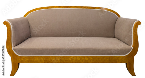 Antique Biedermeier style sofa isolated with authentic fabric