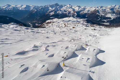 Winter in Ursus Snowpark Aerial Drone Madonna di Campiglio Italy Dolomites Trentino photo