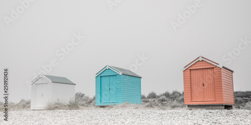 Slika na platnu Findhorn, Scotland - July 2016: Colourful beach huts along the coast at Findhorn