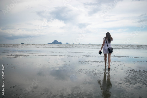 A tourist girl on a beach in Krabi, Thailand, Asia