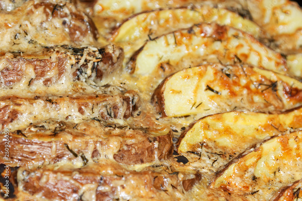 jacket potatoes with cheese. With spices, baked in the oven. jacket potatoes with cheese. With spices, baked in the oven.