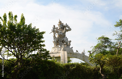 Statue of God fighting with monkeys in Pura Luhur Uluwatu