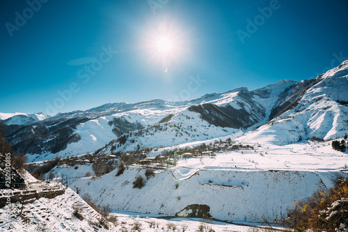 Zemo Mleta, Mtskheta-Mtianeti Region, Georgia. Village Zemo Mleta During Sunny Winter Day. Beautiful Georgian Mountains Landscape In Winter © Grigory Bruev