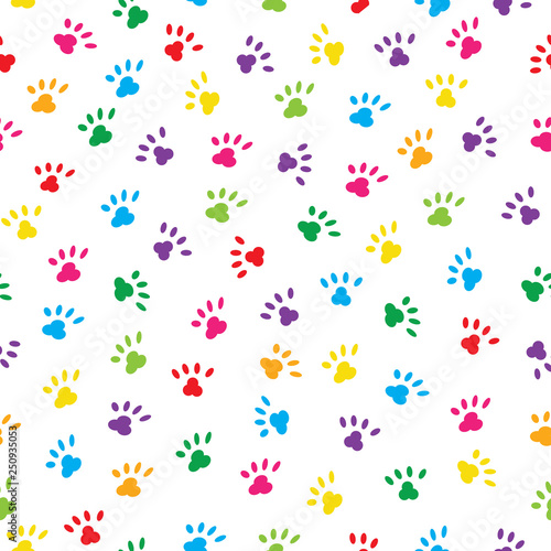 Cute cats paws in rainbow colours . Seamless pattern background.