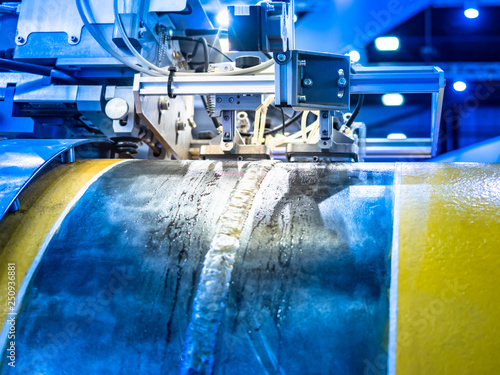 Welding metal in production...
