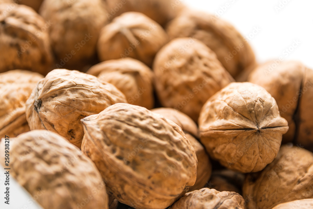 Whole walnuts background. Bunch of walnuts. Whole walnuts background. Bunch of walnuts.