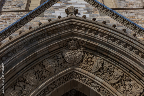 Wallpaper Mural Ottawa CANADA - February 17, 2019: Architecture Details and heraldic insignia on Federal Parliament Building of Canada in Ottawa, North America Torontodigital.ca