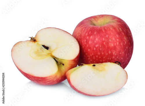 whole and half pink lady apple isolated on white background
