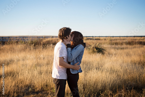 Young couple kissing  photo