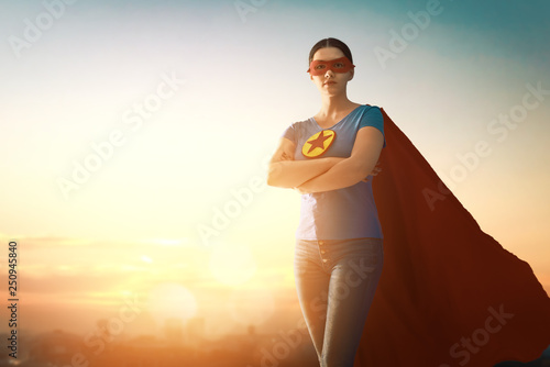 Schilderij op canvas woman in superhero costume