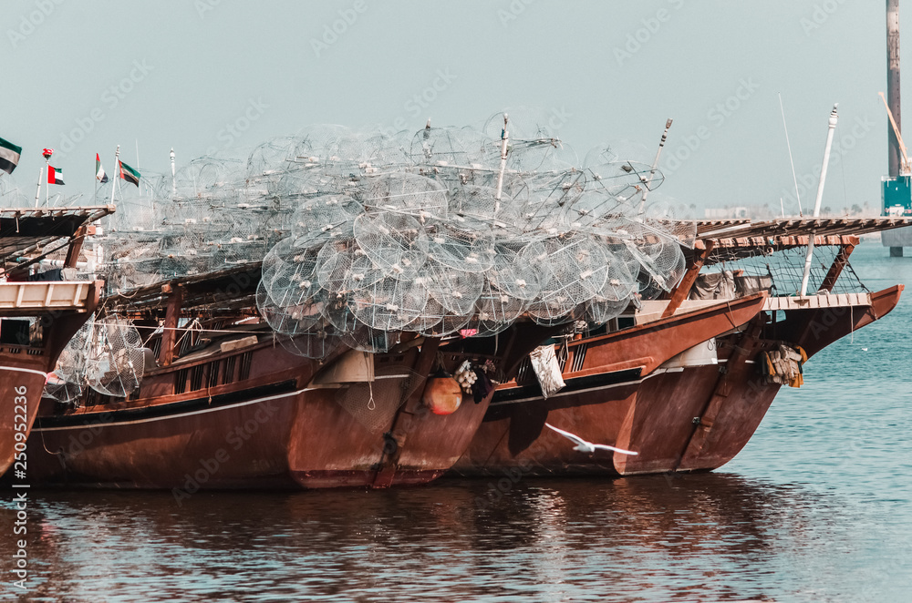 Obraz premium Traditional fishing vessel docked in the harbour
