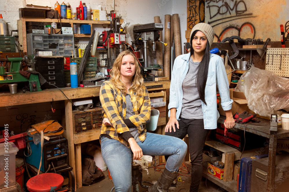 Portrait of female mechanics in workshop Portrait of female mechanics in workshop