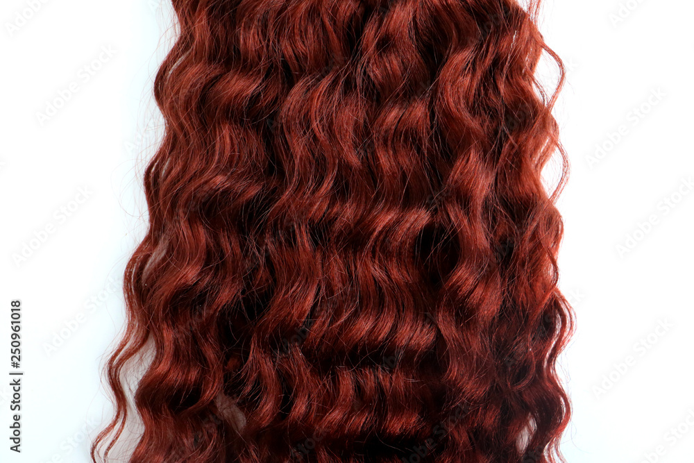 Isolated close up of wavy and curly hair extension Isolated close up of wavy and curly hair extension