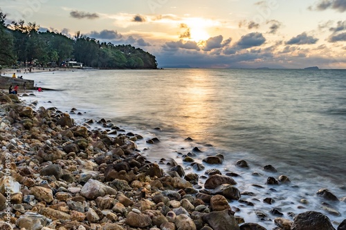 Long exposure shot of Stony Beach at Permai Rainforest Kuching, during sunset photo