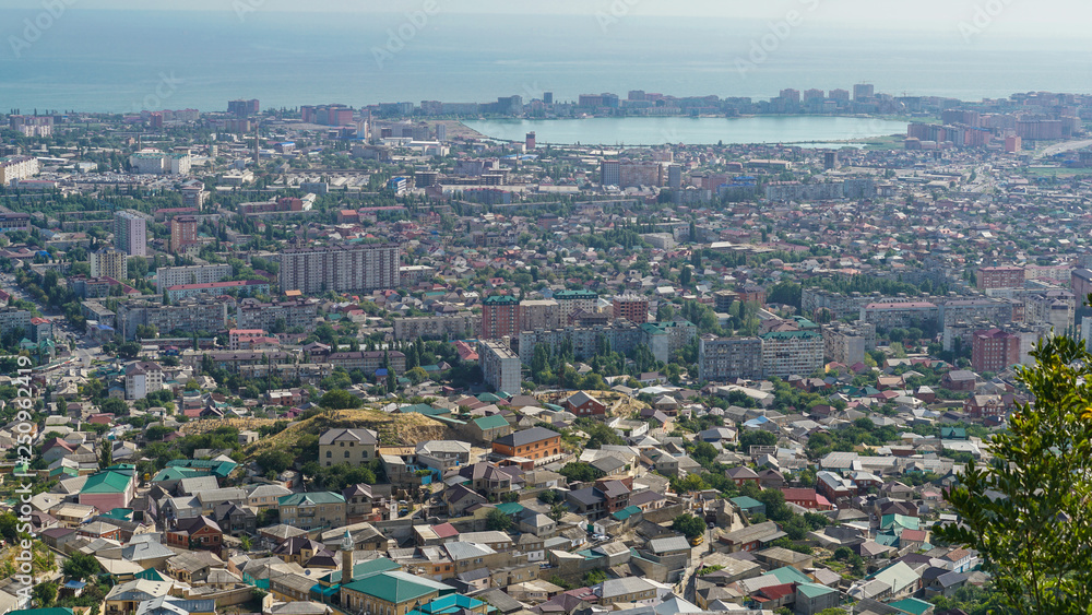 View of the central part of the city of Makhachkala - the capital of the Republic of Dagestan from the mountain Tarki-tau. On the right you can see the lake Ak-Gol