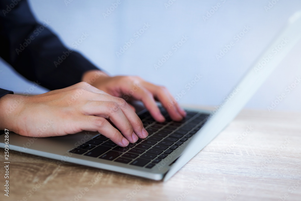 Closeup of business woman working for new project with laptop at sunny office. Closeup of business woman working for new project with laptop at sunny office.