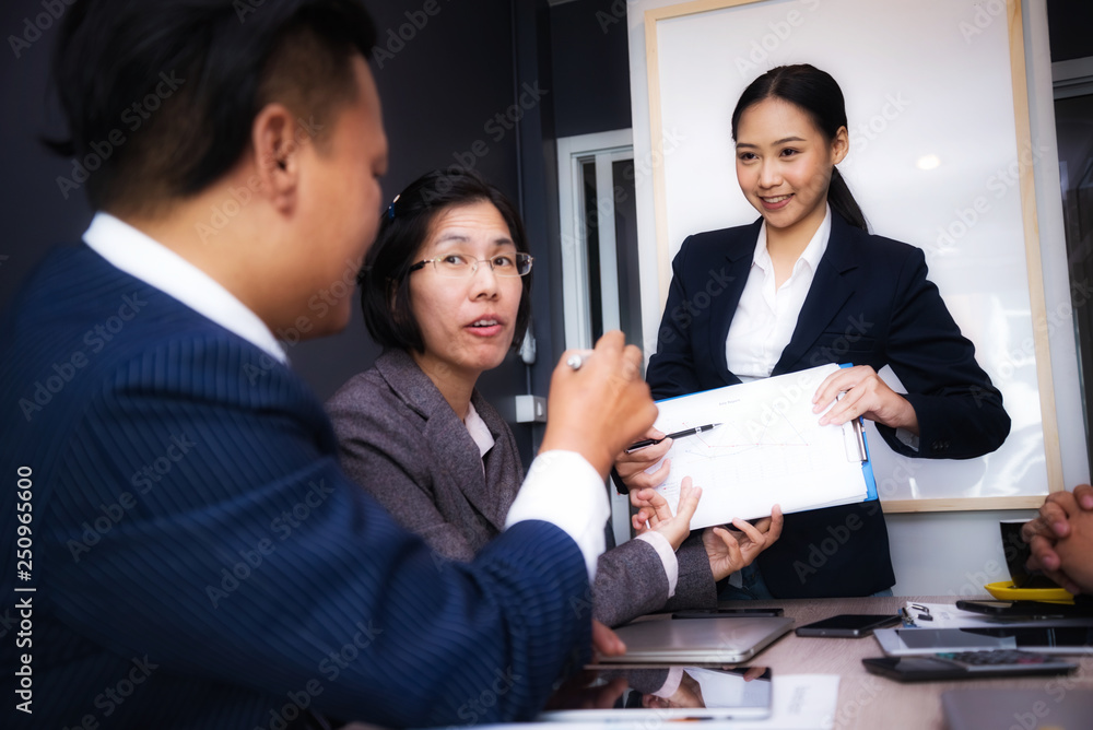 Group of business people meeting about economists working analyzing investment charts. Teamwork successful Meeting Workplace strategy Concept. Group of business people meeting about economists working analyzing investment charts. Teamwork successful Meeting Workplace strategy Concept.