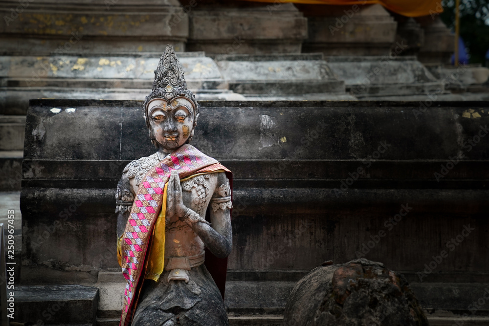 kind of vintage buddhism statue.