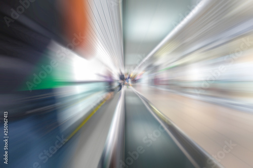 Blurred in motion background on traveler at the airport