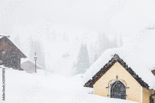 Under a heavy snowfall. Walk in the ancient village of Sappada. Friuli © Nicola Simeoni