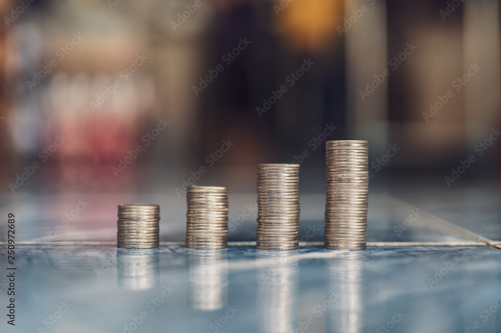 step of coins stacks, money, saving and investment or family planning concept. step of coins stacks, money, saving and investment or family planning concept.