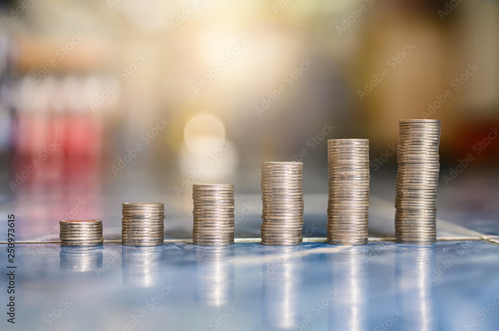 step of coins stacks, money, saving and investment or family planning concept. step of coins stacks, money, saving and investment or family planning concept.