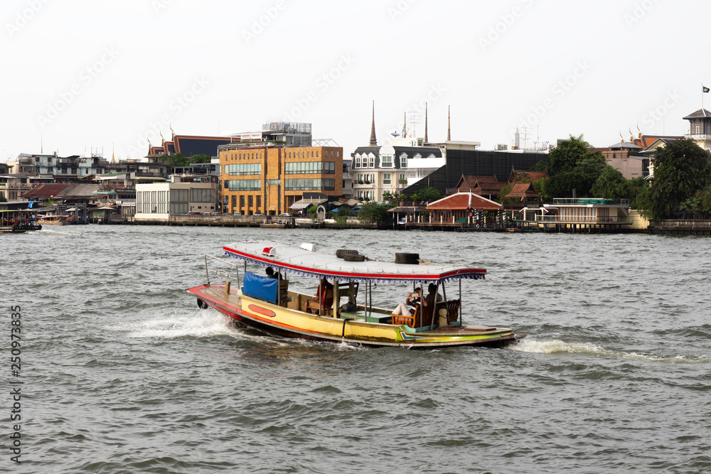 Passenger boats are running in the Chao Phraya River