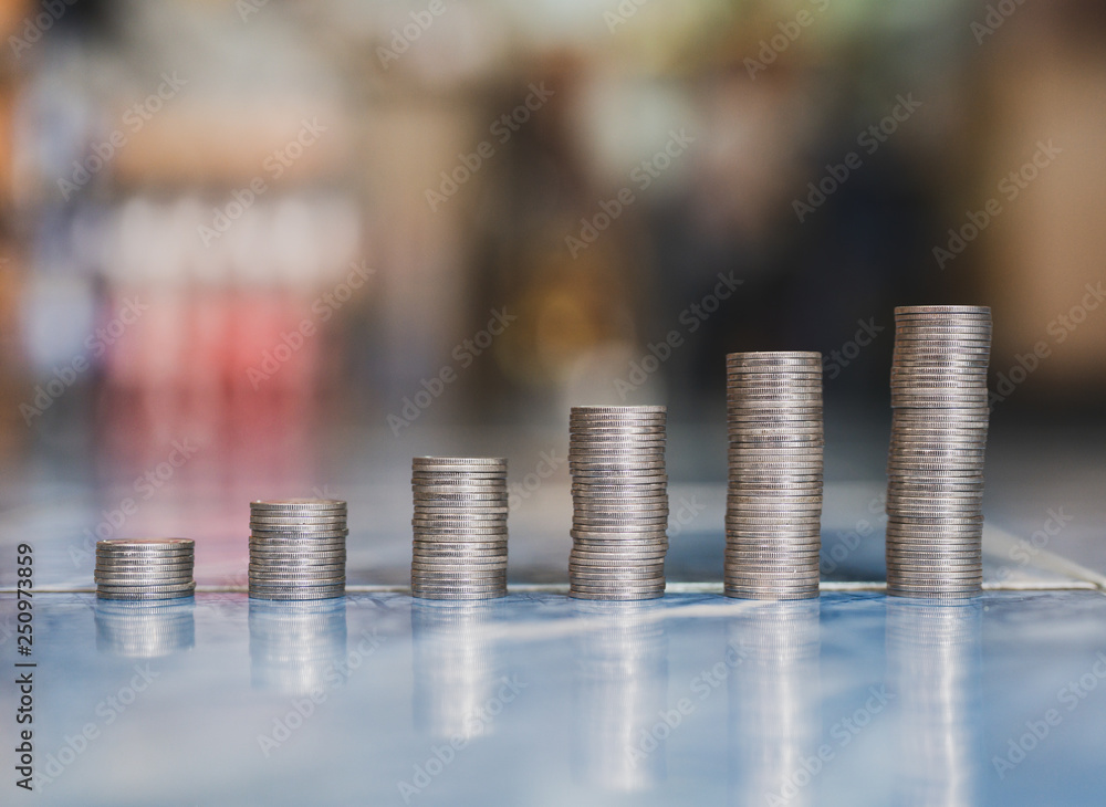 step of coins stacks, money, saving and investment or family planning concept. step of coins stacks, money, saving and investment or family planning concept.