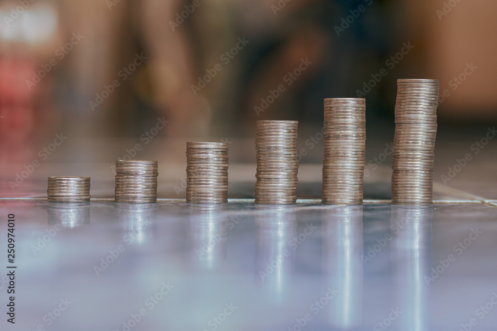 step of coins stacks, money, saving and investment or family planning concept. step of coins stacks, money, saving and investment or family planning concept.