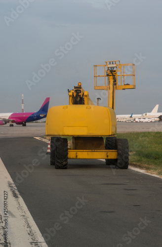 Work machine at the airport, which is used for transport activities.