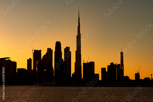 Silhouette of Dubai cityscape with Burj Khalifa at Magic Hour