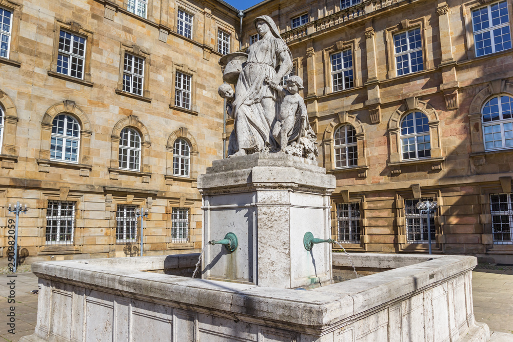 Statue and fountain at the town hall of Kassel, Germany