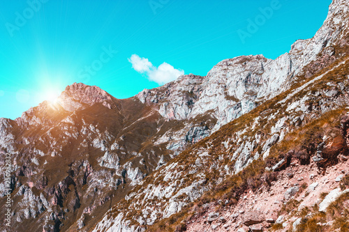 Beautiful Mountain Landscape, Spain, Picos de Europa, rocks and teal sky with white cloud