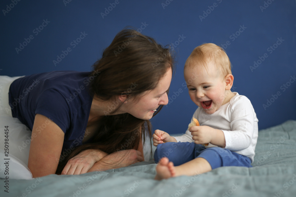 Baby son treats his mother his bread, care Baby son treats his mother his bread, care