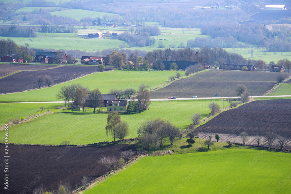 Rural view at spring over fields and farms