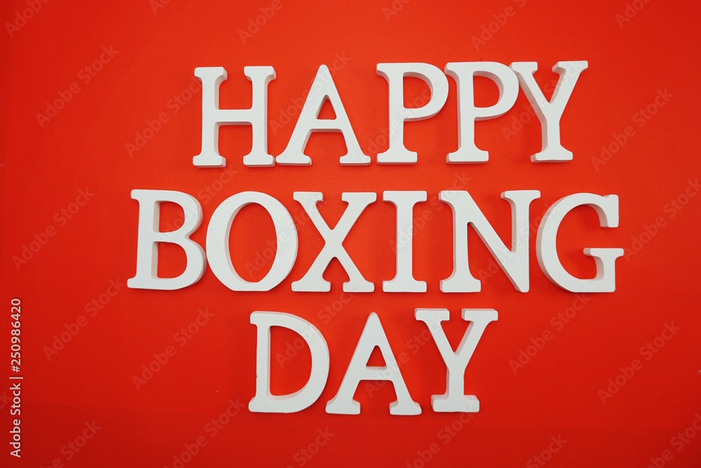 Happy Boxing Day alphabet letters on red background