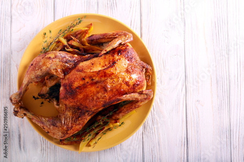 Roast thyme chicken on plate