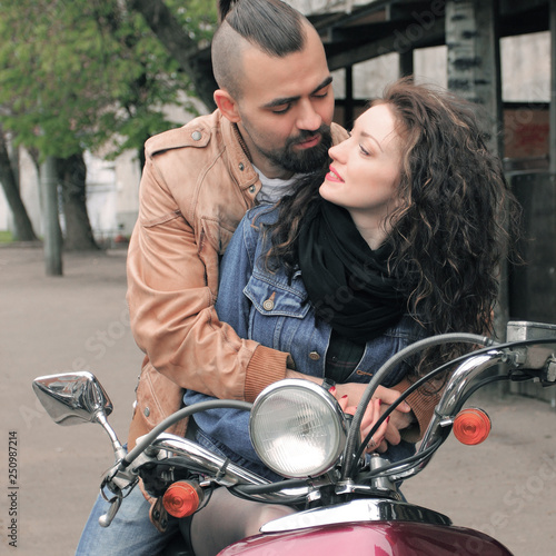 loving couple riding a motorcycle . love story