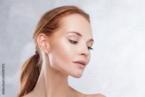 Redhead girl beauty portrait, skin care concept.